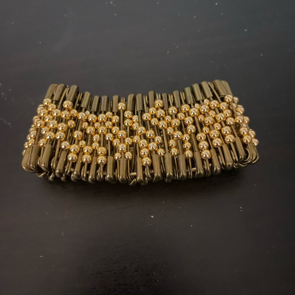 Lovely gold beaded and brown beaded bracelet.